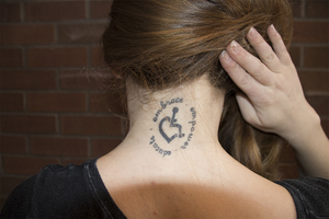 Julia Parus has a tattoo to honor her cousins with the genetic disease muscular dystrophy.