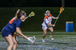 Olivia Adamson opened the scoring in Syracuse's ACC Tournament opener, but UVA's attack proved too much in its upset win. 