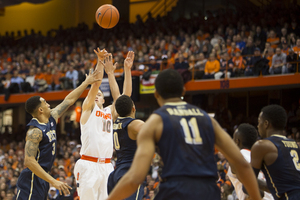 <strong>Trevor Cooney</strong> launches a 3-pointer against Pittsburgh. Cooney scored just three points in the second half against the Panthers.