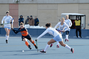 Emma Russell prepares to swat the ball at her feet against North Carolina on Sunday in the NCAA championship game.