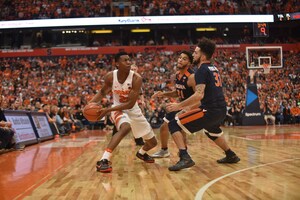 When UVA’s vaunted pack-line defense turned away so many early Orange possessions, Battle was the first Orange player to find answers.