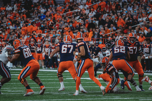 Garrett Shrader and Sean Tucker totaled 314 yards, and the Orange escaped with their first win at Lane Stadium in 20 years.