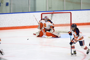 Syracuse moved into first place in the CHA and two of its players won weekly awards.