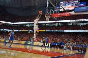 Syracuse's job on the boards combined with its inability to guard Duke's shooters resulted in a 77-55 loss to the Blue Devils