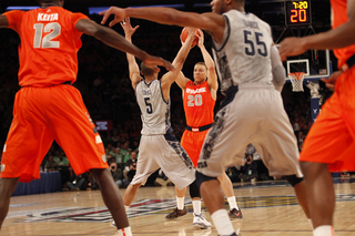 Brandon Triche looks for an opening down the court.