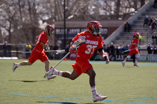 Drew Jenkins works his way toward the SU goal. 