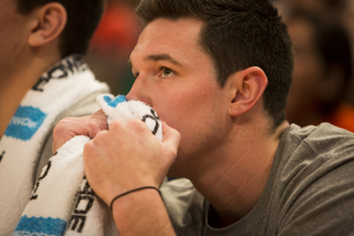 Walk-on Carter Sanderson watches intently during the second half of the Orange's three-point win.