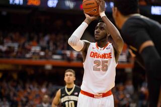 Christmas sets himself to release one of his six free throws during the overtime period.