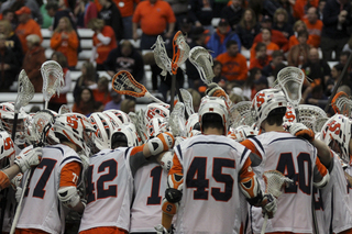 The Orange huddles during its game against the Blue Jays.