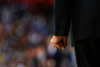 Louisville head coach Rick Pitino wears a sizable ring during UofL's showdown with MSU. His Cardinals won the 2013 national championship.