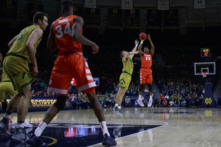 Battle takes a three pointer at the top of the key. He took two shots from that distance and hit one.