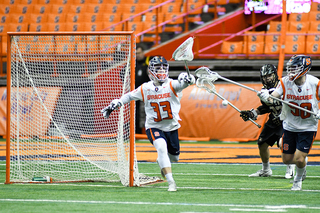 Drake Porter extends his stick for the ball.