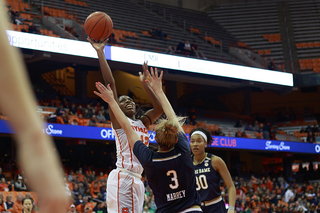 Kiara Lewis shoots a floater over the defense.