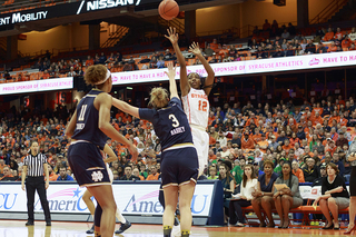 Kiara Lewis shoots a jumper. She played extended minutes with Mangakahia in foul trouble.