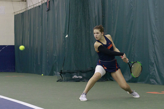 Sofya Golubovskaya hits a return.