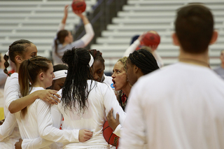 Pregame, Syracuse huddles during shootaround.