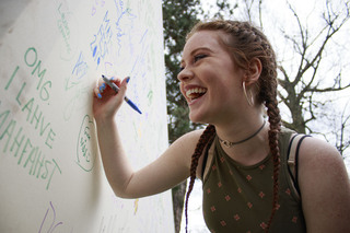 Freshman Allison Scherger signed the signature board along with many other Mayfest attendees.