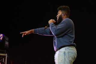 Khalid points to the crowd as he performs.