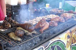 Santillo's eatery offers a slew of carnival food including grilled meat and corn. 