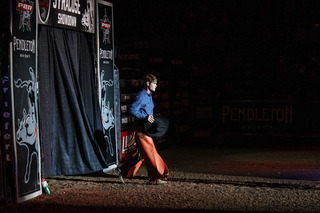 Rider Tristen Marshall from Virginia steps into the arena as his name is announced.