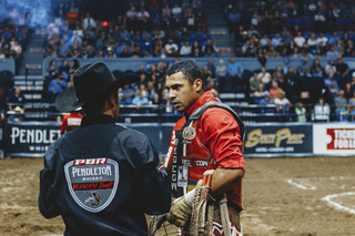 Souza talks to one of the tour helpers after his ride.