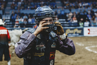 Louis removes his helmet after his ride that gained him the 8 ranked spot.