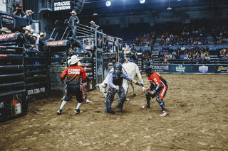 Hostetler scrambles to his feet to run away from his bull.