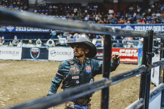 Lino watches the replay of his ride in anticipation as his score is being tallied.