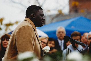 In honor of Thomas Schultz, Mamoudou Camara reads his passage in honor of Schultz.