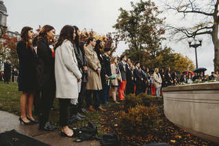 After the roses of the scholars were placed, members of the public were allowed to place their own flowers.