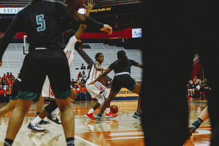 After falling behind 14 points in the first quarter, the Orange used an improved half court offense to erase the deficit.