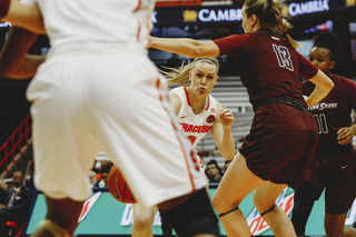 Brooke Alexander, passing the ball into the paint, was one of 33 total substitutions by head coach Quentin Hillsman.