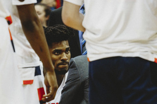 Guerrier looks on during an SU huddle.