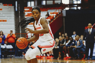 Kiara Lewis scored 10 of her 12 points in the third quarter, and Syracuse expanded its lead to 25 in that span.