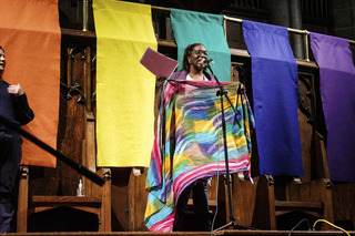 Hernandez explains the symbolism of her multi-color scarf as a representation of diversity. 