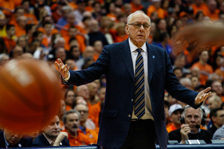 Syracuse head coach Jim Boeheim walked several feet onto the court to confront Girard after the freshman pulled up from far behind the 3-point line.